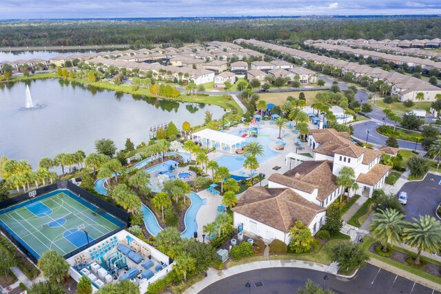 8801 Macapa Dr, Kissimmee, FL 34747 - aerial perspective of suburban area with a nearby body of water