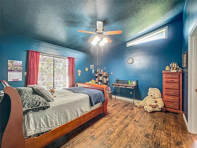 4942 Eden View Ct, Orlando, FL 32810 - bedroom with hardwood / wood-style floors, a textured ceiling, a ceiling fan, and vaulted ceiling