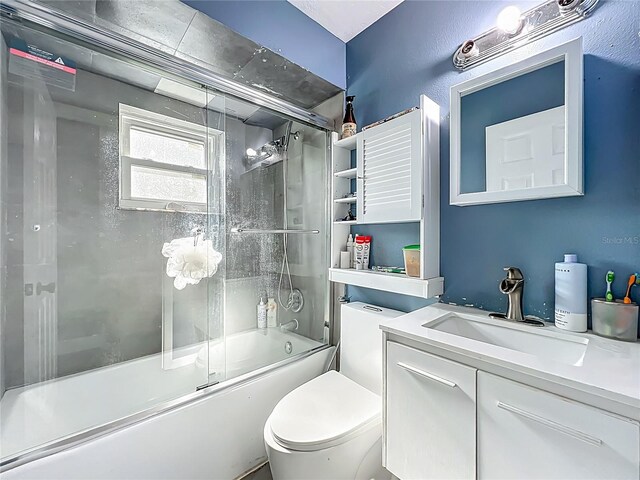 4942 Eden View Ct, Orlando, FL 32810 - full bath featuring vanity, combined bath / shower with glass door, and toilet