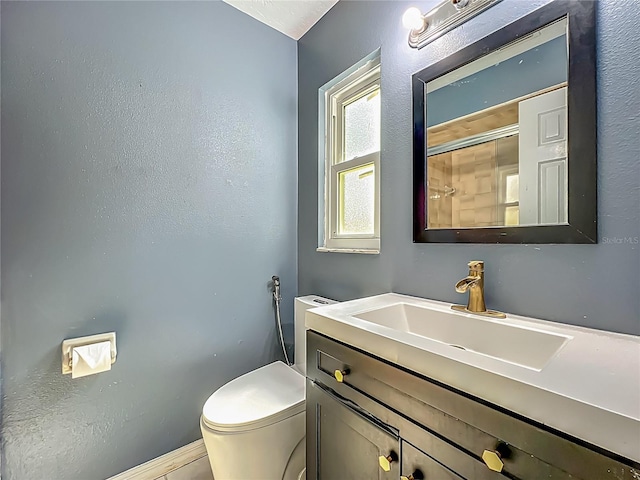 4942 Eden View Ct, Orlando, FL 32810 - full bath featuring vanity, toilet, a shower, and baseboards