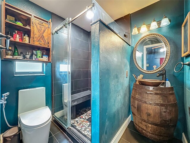 4942 Eden View Ct, Orlando, FL 32810 - full bathroom with tile patterned floors, toilet, a shower stall, and vanity