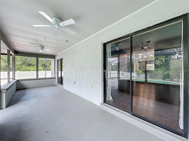 4942 Eden View Ct, Orlando, FL 32810 - unfurnished sunroom featuring a ceiling fan