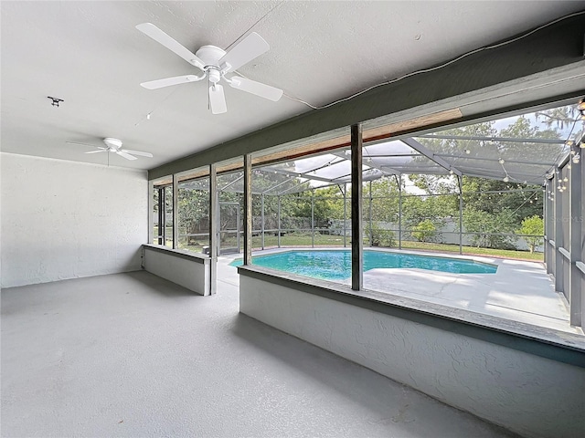 4942 Eden View Ct, Orlando, FL 32810 - unfurnished sunroom featuring a ceiling fan and a swimming pool
