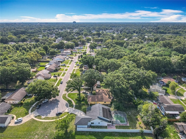 4942 Eden View Ct, Orlando, FL 32810 - view of property location featuring nearby suburban area and a heavily wooded area