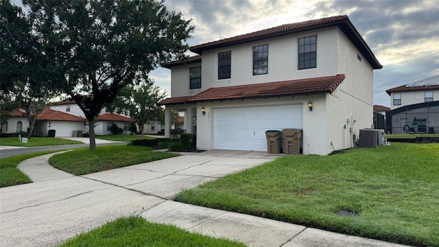 16631 Lazy Breeze Loop, Clermont, FL 34714 - mediterranean / spanish-style house with a garage, stucco siding, driveway, a front yard, and a tile roof