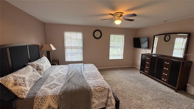 16631 Lazy Breeze Loop, Clermont, FL 34714 - carpeted bedroom featuring baseboards and a ceiling fan