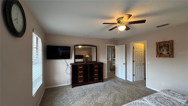 16631 Lazy Breeze Loop, Clermont, FL 34714 - bedroom with carpet flooring, baseboards, and ceiling fan
