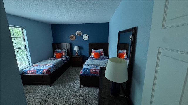 16631 Lazy Breeze Loop, Clermont, FL 34714 - bedroom with a textured ceiling and carpet flooring