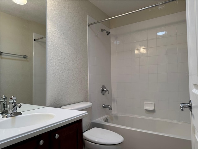 541 Arena Dr, Davenport, FL 33837 - full bathroom with a textured wall, vanity, shower / bath combination, and toilet