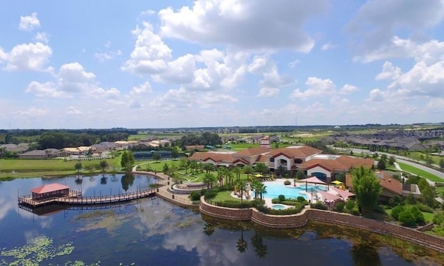 541 Arena Dr, Davenport, FL 33837 - aerial view of residential area featuring a pool and a nearby body of water
