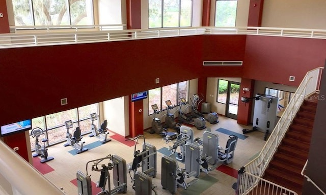 541 Arena Dr, Davenport, FL 33837 - building lobby with a high ceiling and stairway