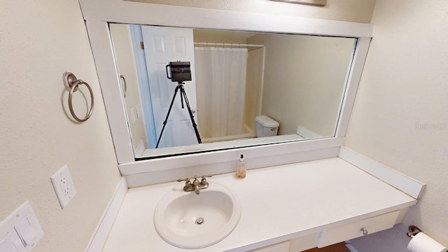 145 Oyster Bay Cir Unit 200, Altamonte Springs, FL 32701 - bathroom featuring toilet, vanity, and a shower with curtain