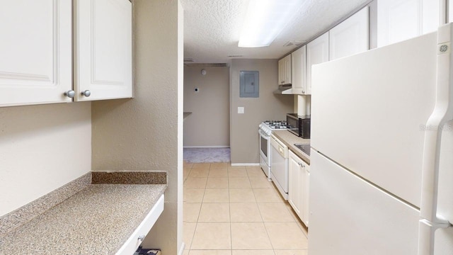 145 Oyster Bay Cir Unit 200, Altamonte Springs, FL 32701 - kitchen with white appliances, light countertops, a textured ceiling, white cabinetry, and electric panel