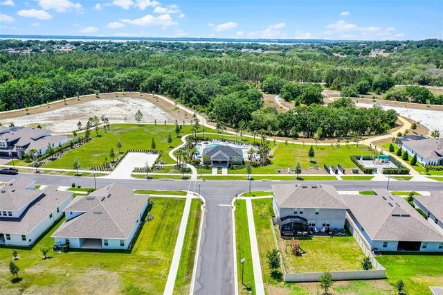 4413 Lions Gate Ave, Clermont, FL 34711 - aerial perspective of suburban area with a heavily wooded area