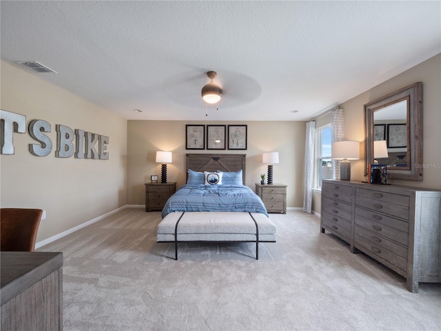 4413 Lions Gate Ave, Clermont, FL 34711 - bedroom with light carpet, ceiling fan, and a textured ceiling