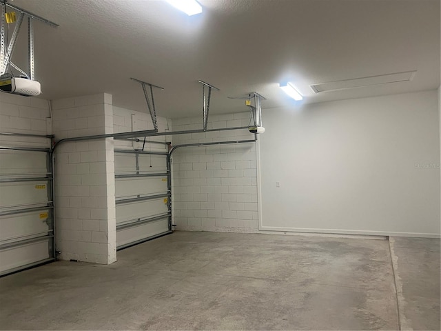 4413 Lions Gate Ave, Clermont, FL 34711 - garage featuring a garage door opener and concrete block wall