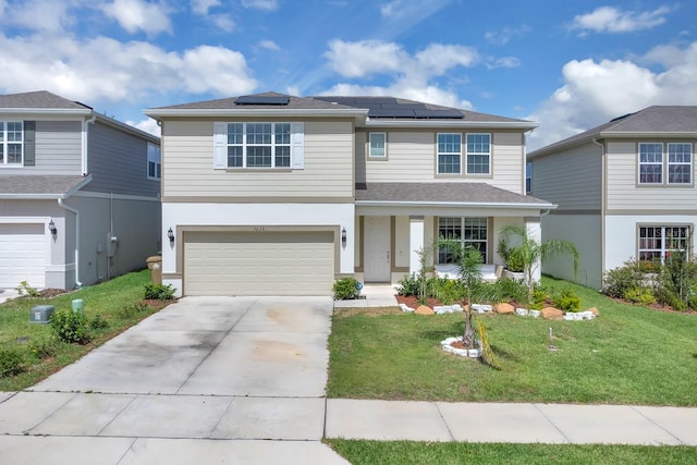 7639 Agrigento St, Clermont, FL 34714 - traditional-style home featuring a front lawn, concrete driveway, a garage, roof mounted solar panels, and covered porch