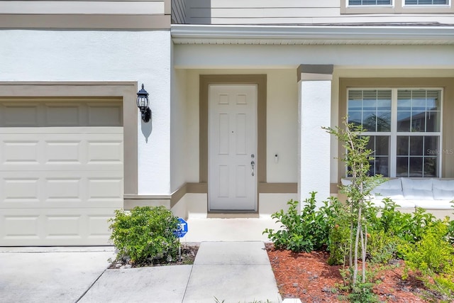 7639 Agrigento St, Clermont, FL 34714 - entrance to property featuring stucco siding and covered porch