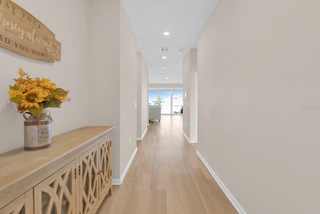 7639 Agrigento St, Clermont, FL 34714 - hall with light wood finished floors and recessed lighting