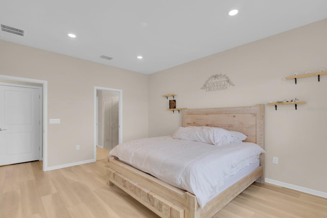 7639 Agrigento St, Clermont, FL 34714 - bedroom featuring light wood-style flooring and recessed lighting
