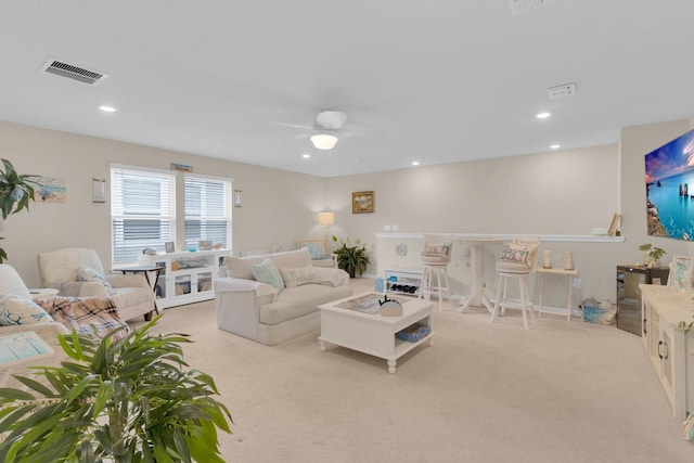 7639 Agrigento St, Clermont, FL 34714 - living room featuring light carpet, recessed lighting, and a ceiling fan