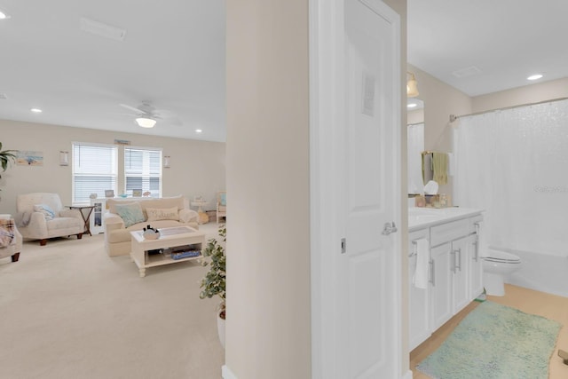 7639 Agrigento St, Clermont, FL 34714 - ensuite bathroom with vanity, ceiling fan, shower / tub combo, and recessed lighting