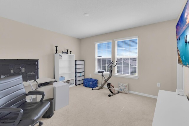 7639 Agrigento St, Clermont, FL 34714 - home office featuring light carpet and baseboards