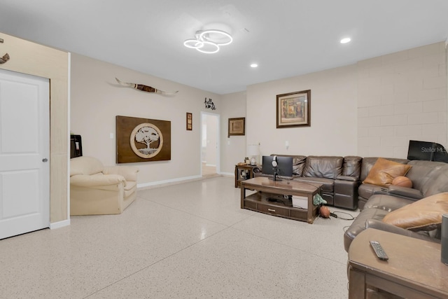 7639 Agrigento St, Clermont, FL 34714 - living room featuring speckled floor and recessed lighting