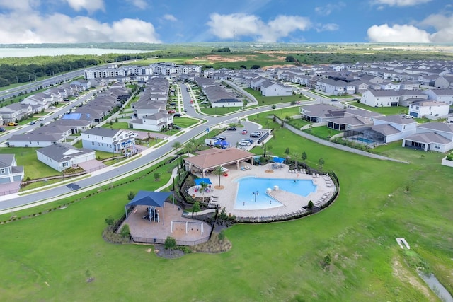 7639 Agrigento St, Clermont, FL 34714 - aerial perspective of suburban area featuring a pool area and a large body of water