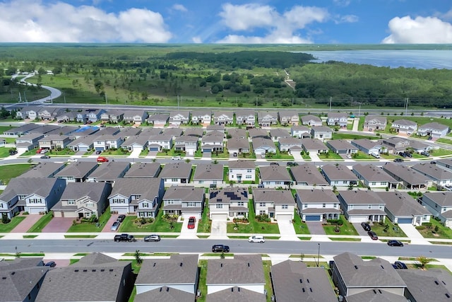 7639 Agrigento St, Clermont, FL 34714 - aerial view of residential area with a large body of water