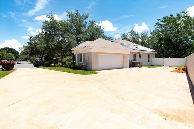 1586 Antoinette Ct, Oviedo, FL 32765 - view of front of property featuring driveway, stucco siding, an attached garage, and a gate