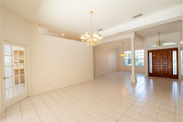 1586 Antoinette Ct, Oviedo, FL 32765 - foyer with a chandelier, light tile patterned floors, recessed lighting, and ornate columns