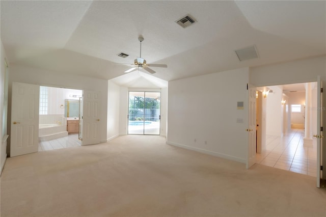 1586 Antoinette Ct, Oviedo, FL 32765 - unfurnished room with light colored carpet, ceiling fan, lofted ceiling, and light tile patterned flooring