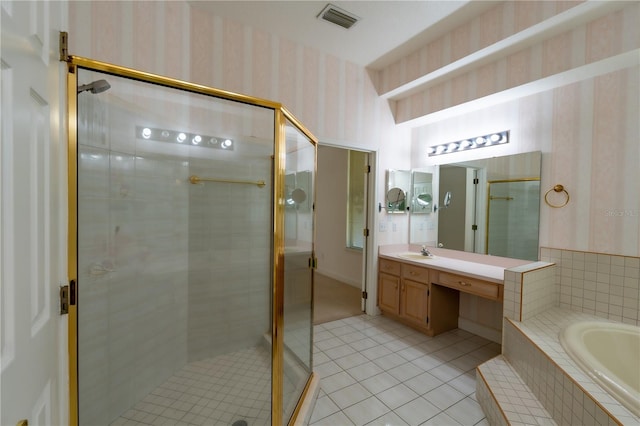 1586 Antoinette Ct, Oviedo, FL 32765 - bathroom with wallpapered walls, tile patterned floors, a stall shower, a garden tub, and vanity