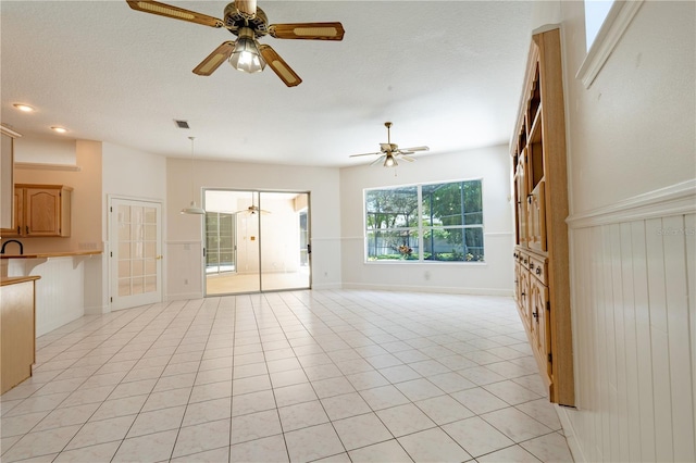 1586 Antoinette Ct, Oviedo, FL 32765 - unfurnished living room with a ceiling fan and light tile patterned floors