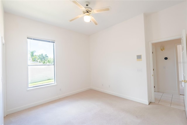 1586 Antoinette Ct, Oviedo, FL 32765 - empty room featuring light carpet and a ceiling fan