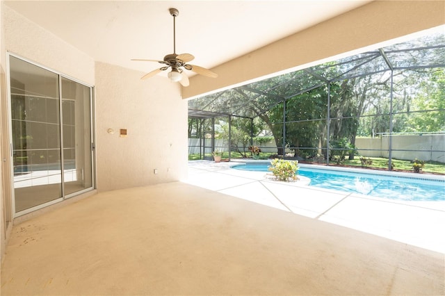 1586 Antoinette Ct, Oviedo, FL 32765 - view of pool with a patio area, a ceiling fan, a fenced backyard, and a lanai