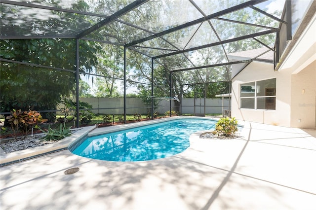 1586 Antoinette Ct, Oviedo, FL 32765 - view of swimming pool featuring a patio area, a fenced backyard, and glass enclosure