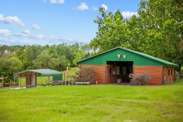 12434 Sullivan Rd, Clermont, FL 34715 - view of pole building featuring a lawn and a carport