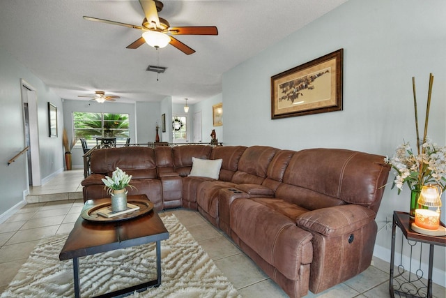 12434 Sullivan Rd, Clermont, FL 34715 - living room featuring a ceiling fan and light tile patterned floors