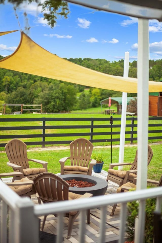 12434 Sullivan Rd, Clermont, FL 34715 - view of patio featuring a fire pit