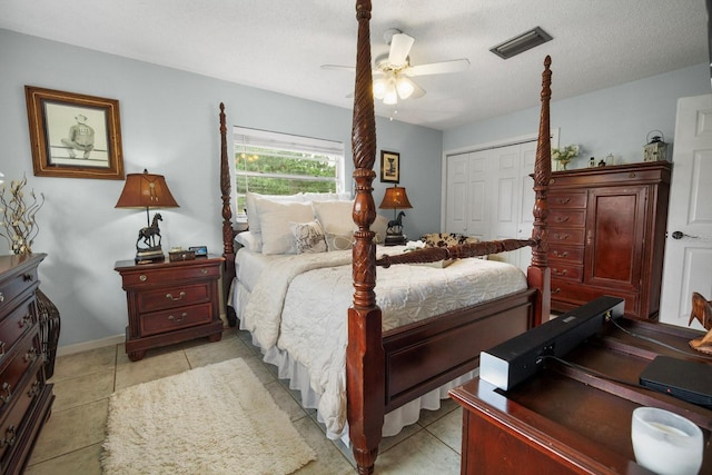 12434 Sullivan Rd, Clermont, FL 34715 - bedroom featuring a closet, ceiling fan, and light tile patterned floors