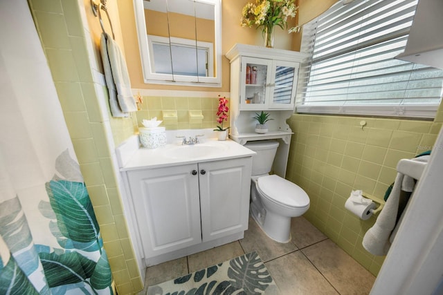 12434 Sullivan Rd, Clermont, FL 34715 - full bathroom with tile walls, tile patterned floors, and vanity