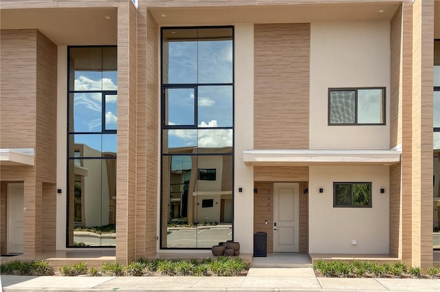 7461 Bleecker Ln, Kissimmee, FL 34747 - view of front of home with stucco siding