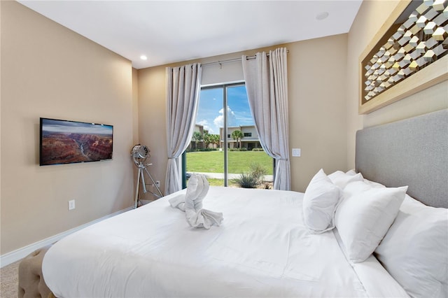 7461 Bleecker Ln, Kissimmee, FL 34747 - carpeted bedroom with access to exterior and recessed lighting