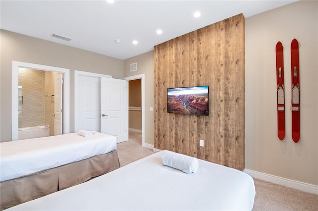 7461 Bleecker Ln, Kissimmee, FL 34747 - bedroom featuring light carpet, recessed lighting, and connected bathroom