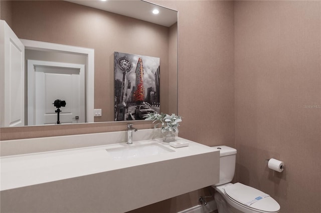 7461 Bleecker Ln, Kissimmee, FL 34747 - half bathroom with vanity and recessed lighting