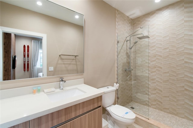 7461 Bleecker Ln, Kissimmee, FL 34747 - bathroom with tiled shower, vanity, and recessed lighting