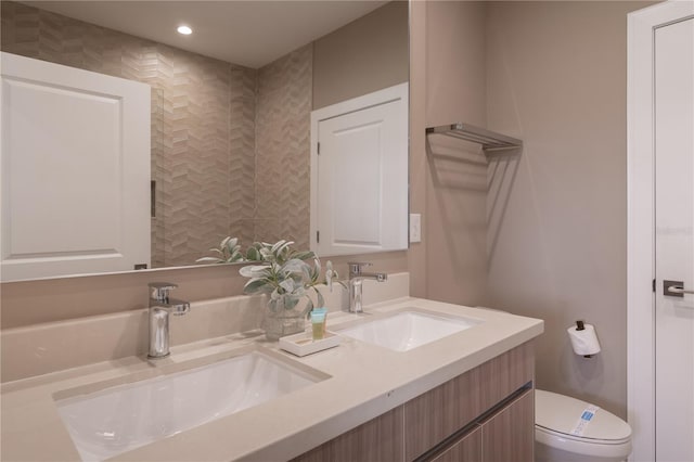 7461 Bleecker Ln, Kissimmee, FL 34747 - bathroom featuring double vanity and recessed lighting