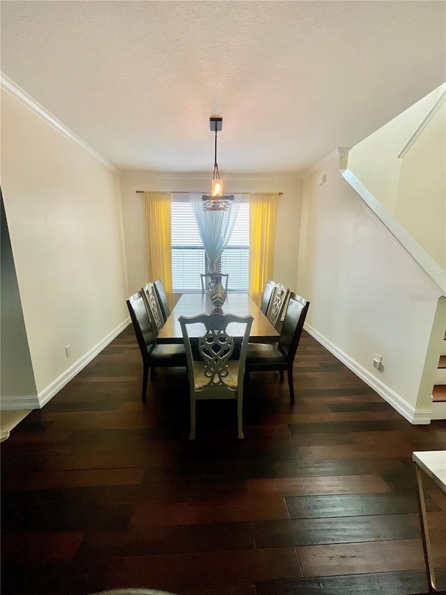 312 Partridge Pea Ln, Ocoee, FL 34761 - dining area featuring dark wood-type flooring and ornamental molding